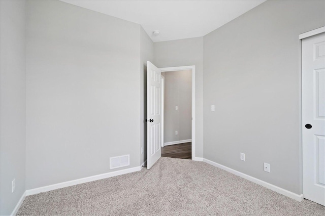 unfurnished bedroom featuring carpet flooring