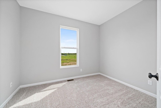 spare room with carpet flooring