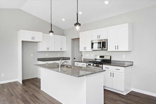 kitchen with stainless steel appliances, white cabinetry, and sink