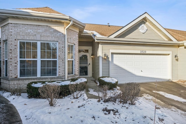 single story home with a garage