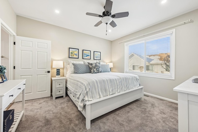 carpeted bedroom featuring ceiling fan