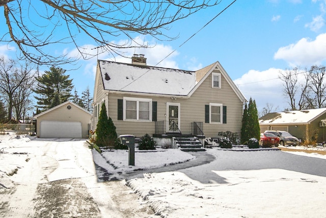 view of front of house with an outbuilding and a garage