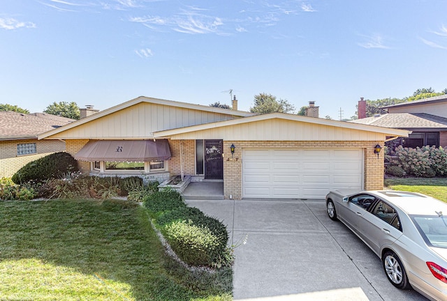 ranch-style house with a garage and a front yard