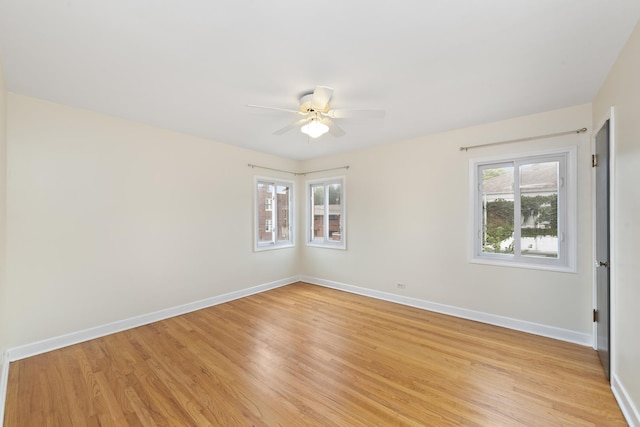 unfurnished room with ceiling fan, a healthy amount of sunlight, and light hardwood / wood-style flooring