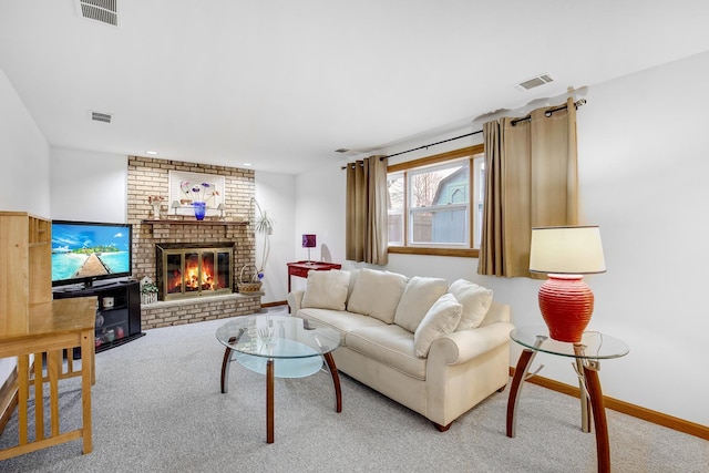 living room featuring a brick fireplace and carpet