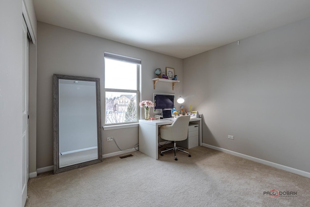 carpeted office space featuring a wealth of natural light