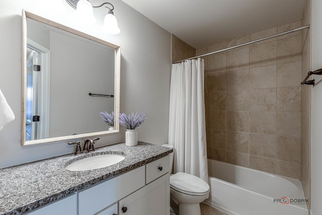 full bathroom featuring toilet, vanity, and shower / bath combination with curtain