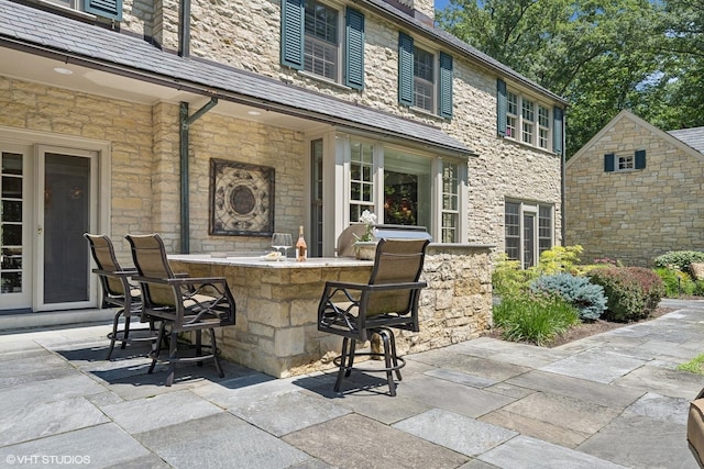 view of patio / terrace with exterior bar