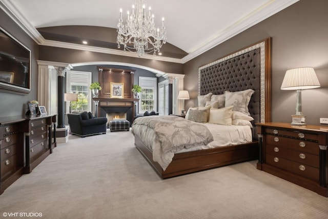 bedroom with light carpet, decorative columns, vaulted ceiling, and crown molding