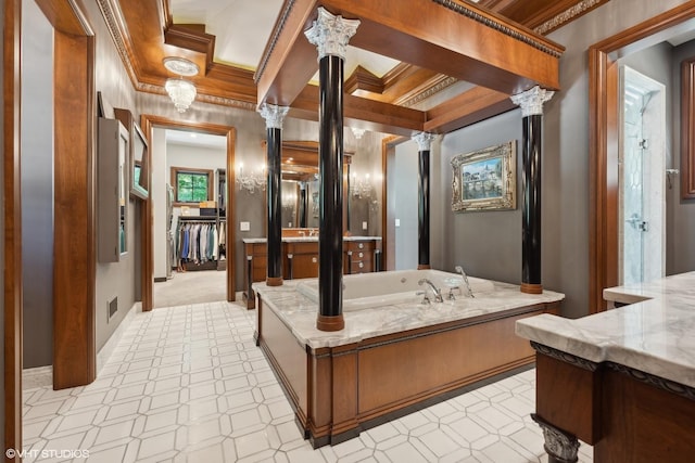 full bathroom featuring visible vents, vanity, ornamental molding, a bath, and ornate columns