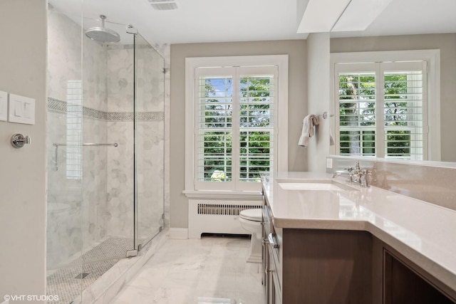 bathroom with visible vents, toilet, radiator heating unit, a stall shower, and vanity