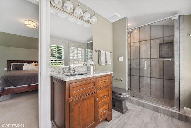 bathroom featuring toilet, a shower with door, vanity, and vaulted ceiling