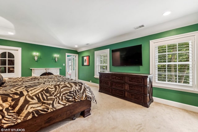 carpeted bedroom featuring baseboards, visible vents, crown molding, and recessed lighting