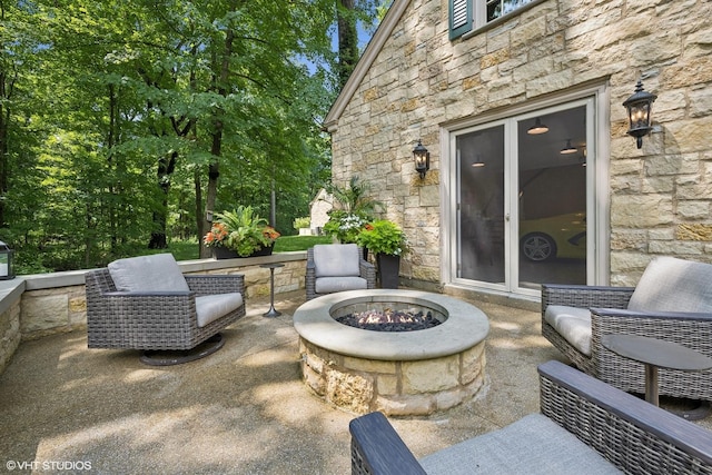 view of patio featuring a fire pit