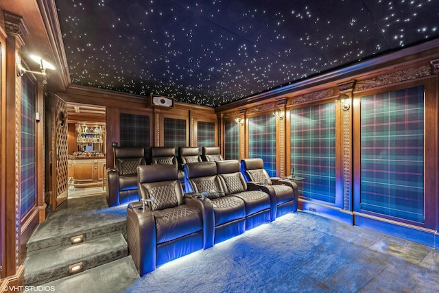 home theater with crown molding and carpet flooring