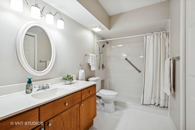 bathroom with vanity, curtained shower, tile patterned floors, and toilet