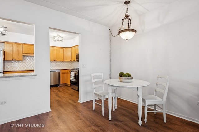 dining room with dark wood-type flooring