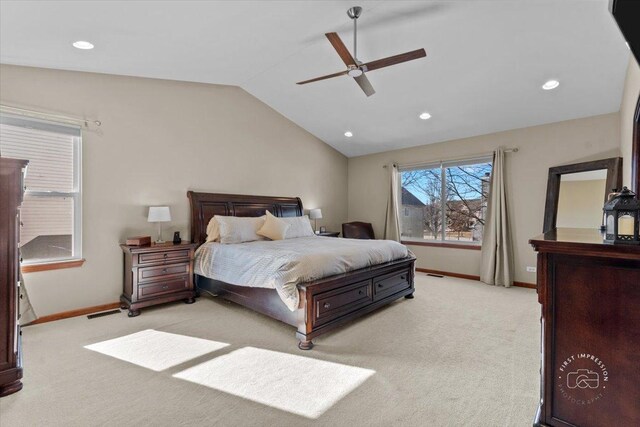 carpeted bedroom with lofted ceiling and ceiling fan