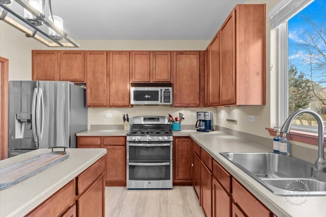 kitchen with appliances with stainless steel finishes and sink