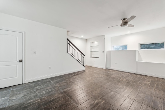 spare room with ceiling fan