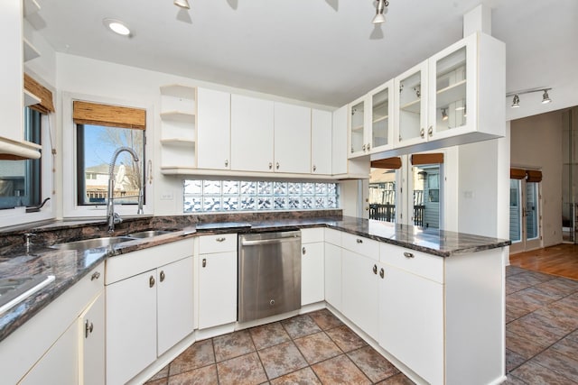 kitchen with kitchen peninsula, sink, white cabinetry, and dishwasher