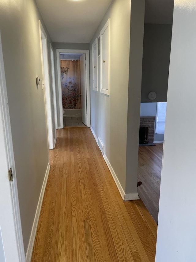 hall featuring light wood-type flooring