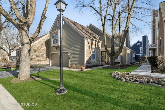 view of property exterior featuring a lawn and a garage