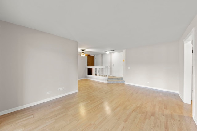 unfurnished living room featuring light hardwood / wood-style floors