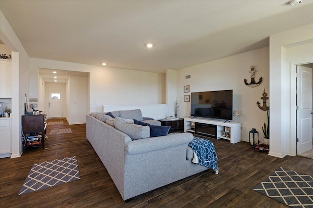 living room featuring dark hardwood / wood-style floors