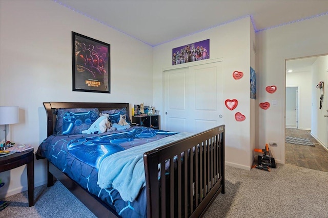 bedroom featuring a closet and carpet