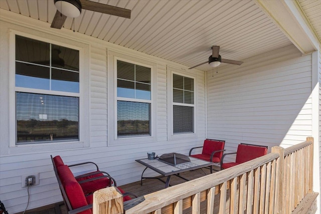 wooden deck with ceiling fan