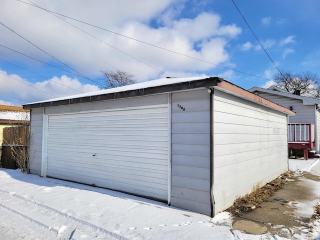 view of snow covered garage