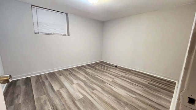 unfurnished room featuring light hardwood / wood-style floors