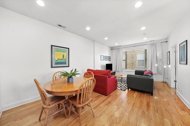 dining area featuring light hardwood / wood-style flooring