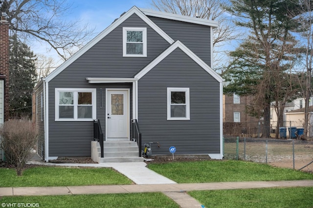 view of front of home featuring a front lawn