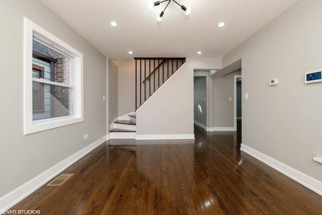 interior space with hardwood / wood-style floors