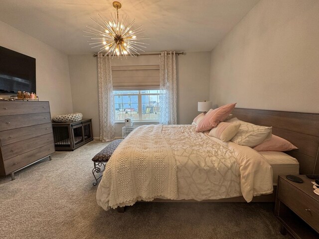 carpeted bedroom with a notable chandelier