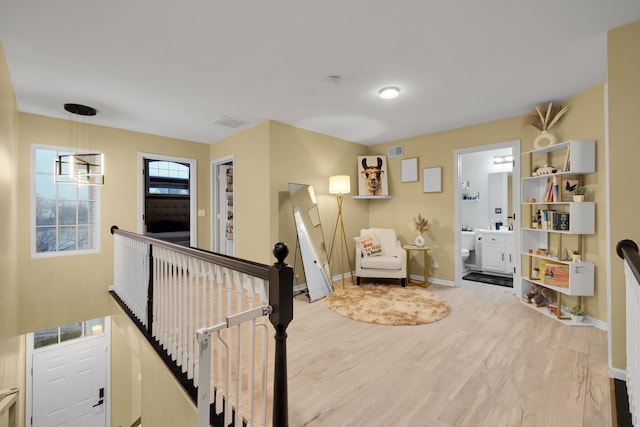 sitting room featuring hardwood / wood-style floors