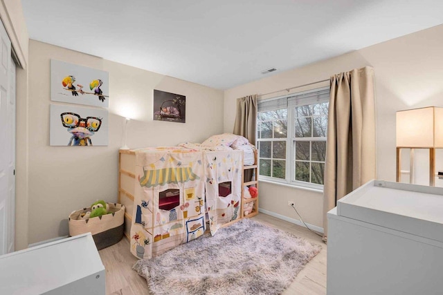 bedroom featuring light hardwood / wood-style flooring