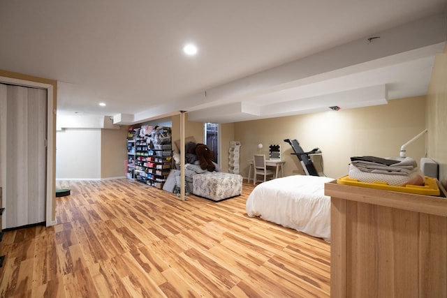 bedroom featuring a closet and hardwood / wood-style flooring