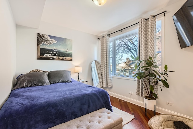 bedroom featuring dark hardwood / wood-style floors