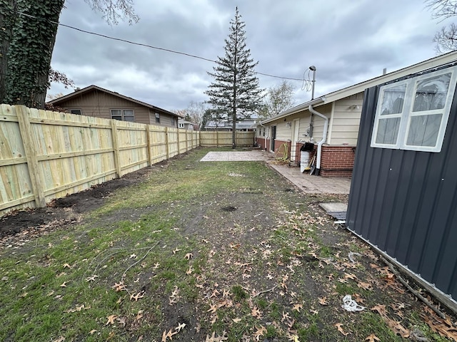 view of yard featuring a fenced backyard