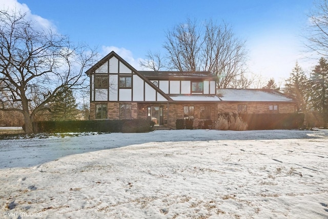 view of snow covered house