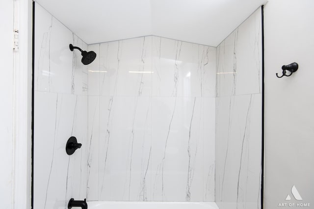 details featuring tiled shower