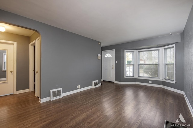 entrance foyer featuring dark wood-type flooring