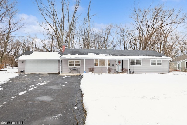 single story home featuring a garage