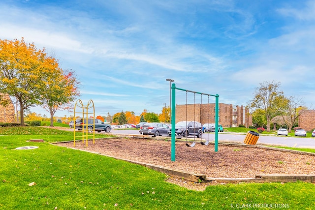 view of play area featuring a lawn