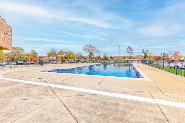 view of swimming pool featuring a patio area