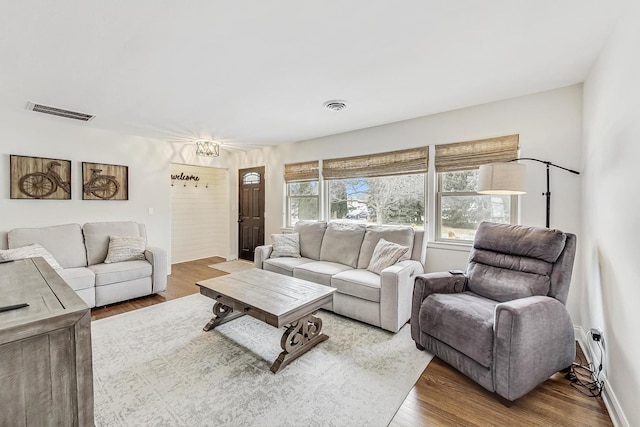 living room with hardwood / wood-style flooring