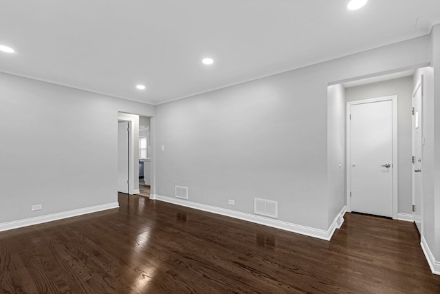 unfurnished room featuring dark hardwood / wood-style floors